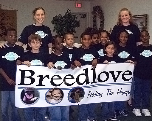 Group of school children with teachers after Breedlove fundraising campaign.