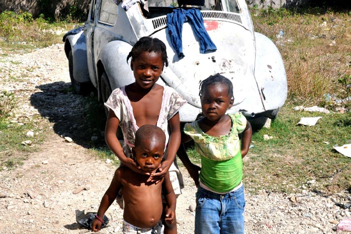 Children in Haiti stricken by poverty and disaster.