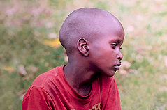 Young boy suffering from hunger.